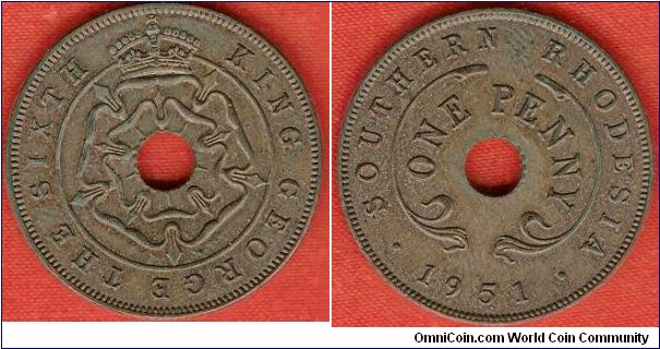 Southern Rhodesia
1 penny
King George VI 
crowned rose
with center hole
bronze
