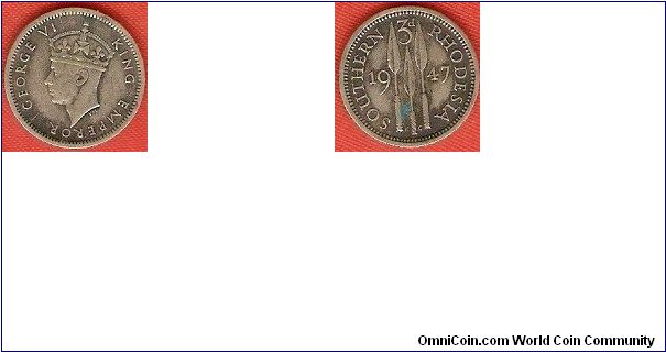 Southern Rhodesia
3 pence
George VI King Emperor, portrait by Percy Metcalfe
3 spears
copper-nickel