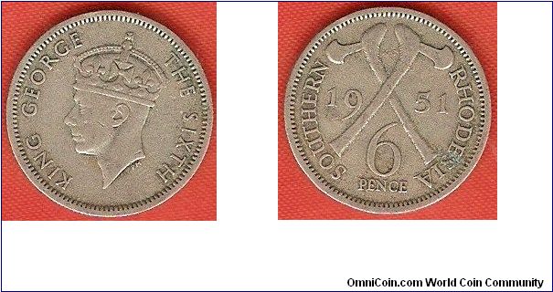 Southern Rhodesia
6 pence
King George VI, portrait by Percy Metcalfe
crossed axes
copper-nickel