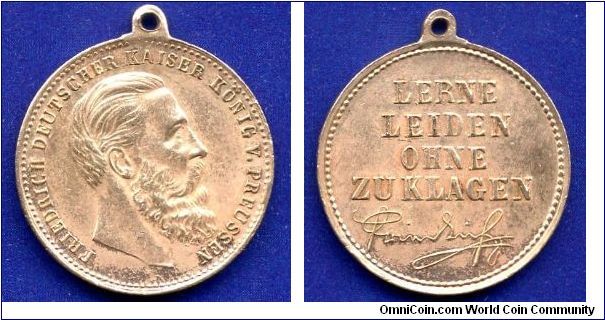 Medal of saying the Kaiser Friedrich III (1888) *Lerne Lieden Ohne Zu Klagen*. 
For what and to whom it gave a brass medal, I never found out. 
Maybe those will help tell what kind of medal, and for which issued (apparently in the schools)?


Br.