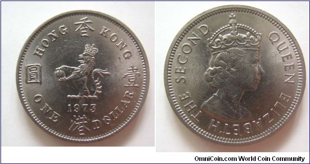 UNC grade 1973 years 1 dollars,Hong Kong,it has 30mm diameter,weight 11.9g.