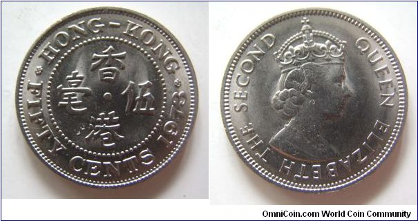1973 years 50 cents,Hong Kong,it has 23mm diameter,weight 5.8g.