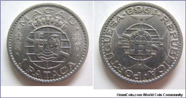 UNC grade 1968 years 1 Dollar.Macau.It has 28.5mm diameter,weight 10.6g