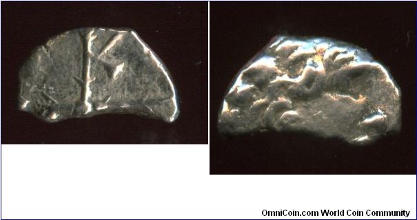 80-20 BC
Montlaures Southern France
Cross dividing coin into four quarters 
Head?
Monnaies a la Croix 
silver 1.65g 
LL15