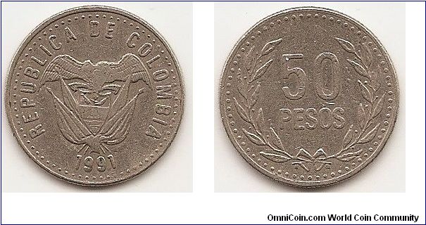 50 Pesos
KM#283.1
4.5000 g., Copper-Nickel-Zinc, 21.8 mm. Obv: Flagged arms above date Rev: Denomination within wreath, 66 beads circle around rim Note: Varieties exist.