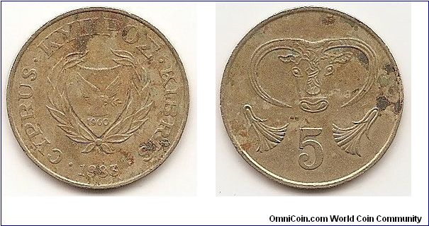 5 Cents
KM#55.1
Nickel-Brass, 22 mm. Obv: Shielded arms within wreath, date below Rev: Stylized bulls head, value number surrounded by single line