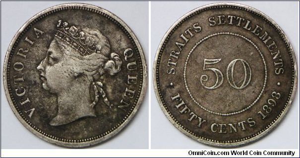 British Straits Settlements Victoria 50 Cents 1898. Lower grade example borderline very fine.[SOLD]