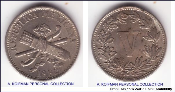 KM-399, 1882 Mexico 5 centavos' copper nickel, plain edge; this was one of the first Mexico attempts  out to replace silver for small coinage - 1, 2 and 5 centavos, obviously not very sccessul becaus it was not repeated until XX'th century; coin has either a flan defect or small rim nick on reverse, also several lamination peeling areas on both sides; about uncirculated for wear with original luster showing well, especially on obverse.