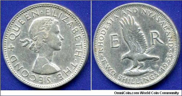 2 shillings.
Rhodesia & Nyasaland.
Elizabeth II.
Mintage 1,850,000 units.


Cu-Ni.