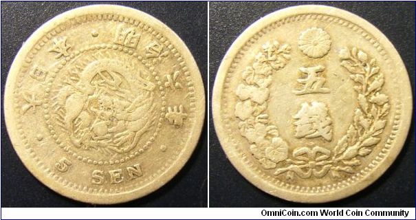 Japan 1873 5 sen. Relatively worn for a small coin.