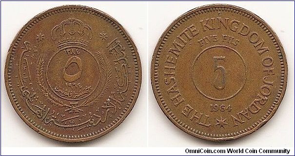 5 Fils (1/2 Qirsh)- AH1382- KM#9
4.5000 g., Bronze, 21 mm. Ruler: Hussein Ibn Talal Obv: Value and date within crowned circle within sprigs Rev: Value within
circle above date Edge: Plain