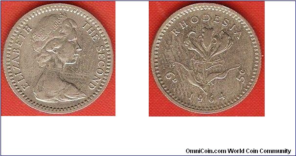 6 pence / 5 cents
Elizabeth II by Arnold Machin
Flame lily
copper-nickel