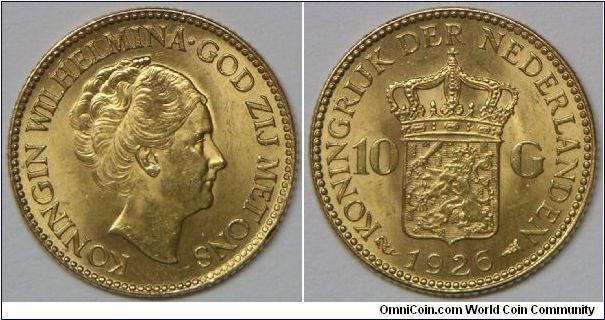 Wilhelmina I 10 Gulden, 1926. 6.7g, 0.9000 Gold, .1947 oz. AGW., 22.5mm. Mintage: 2,500,000 units. Choice Lustrous AU to Borderline UNC. [SOLD]