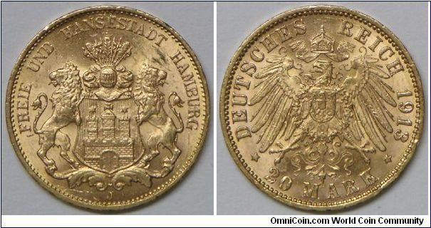 German States - Hamburg Free City, 20 Mark, 1913J. 7.94g, 0.9000 Gold, .2305 oz. AGW. Mintage: 491,133. Minor rim nick. Lustrous Choice AU.