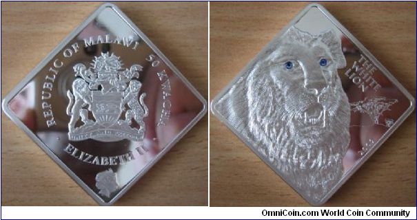 50 Kwacha - White lion - 2 oz Ag .999 Proof (with 2 blue Swarovski crystals eyes) - mintage 2,500