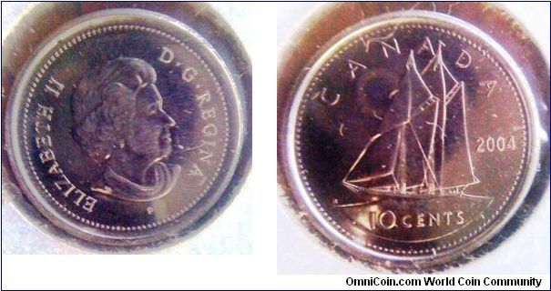 Canada 10 cents shiny nickel 
17.5mm diameter
thanks MarcR!
