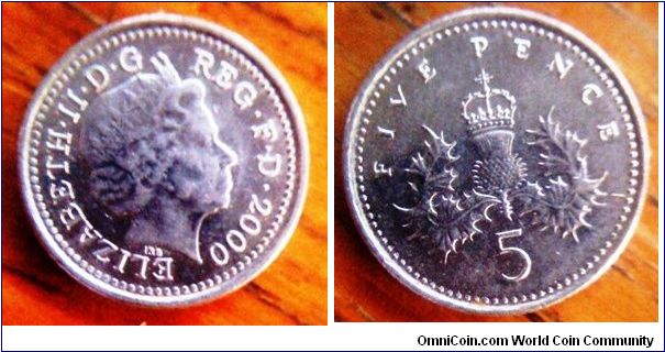 UK 5 Pence nice shiny white metal 
18mm diameter