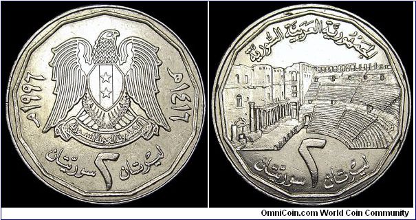 Syria - 2 Lira (Syrian Pounds) - AH 1416 / 1996 - Weight 6,0 gr - Stainless steel - Size 23 mm - Reverse / Ancient ruins and value - Edge : Reeded - Reference KM# 125