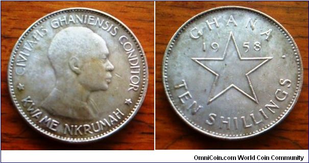 Ghana 10 Shillings Silver coin, crown sized.
showing Dr Kwame Nkrumah 
38mm diameter, 25 grams 0.925 Fine. One of the very nice coins from Africa