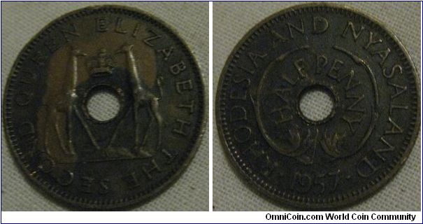 rhodesia halfpenny dark coloured coin.
