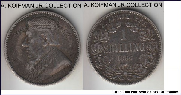 KM-5, 1896 ZAR (South Africa) shilling; silver, reeded edge; Boer Republic issue, grattifi on the obverse with the Kruger's hat and pipe added and collar decorated is frequently attributed to the bored Boer prisoners of the British POW camps, I do not know how many of these are autherntic or were added later, but this coin is a good fine plus, maybe better.
