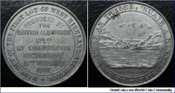 Aluminium Medal 1907 Kinlochleven, Scotland. RRR.38mm.
This medal was made from the first batch of metal from the first water powered aluminium smelter. DE NACH DEAN AN T'UISGE, 'NUAIR A RINN E MISE. = What water can not do, when it can make me.