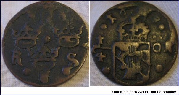 1/4 ore 1638, a cast coin, hence the large cudding, this was the normal practace of minting in that period in sweden