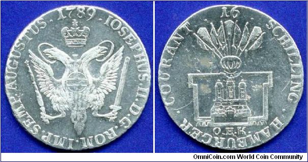 16 schilling (1/3 Thaler).
Free Imperial City Hamburg.
Ioseph II (1765-1790) Emperor of Holy Roman Empire.
'OHK' - Otto Henrich Knorre 1761-1805.
Mintage 80,000 units.


Ag750f. 9,16gr.