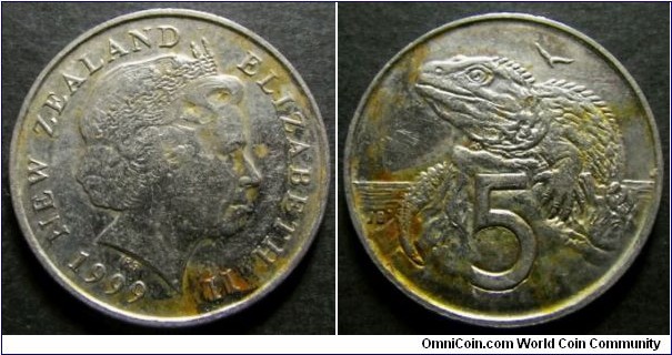 New Zealand 1999 5 cents. Found it circulating in Australia. Rust effect all over the coin?