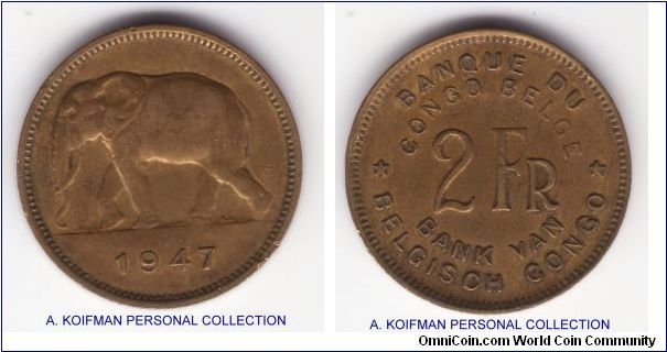 KM-28, 1947 Belgian Congo 2 francs; brass, plain edge; good very fine, a small rim nick on obverse