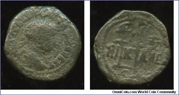 Severus Alexander 'Aquila and Standards' 
AE22 Bronze Nicaea, Bithynia. 222-235ad
MAVP CEVH ALEXANDPOC AV, laureate, draped and cuirassed bust right, seen from back 
NI-K-AI-E / ON, between and below three standards
Same as SNGCop 520 but 6.4g not 4.4