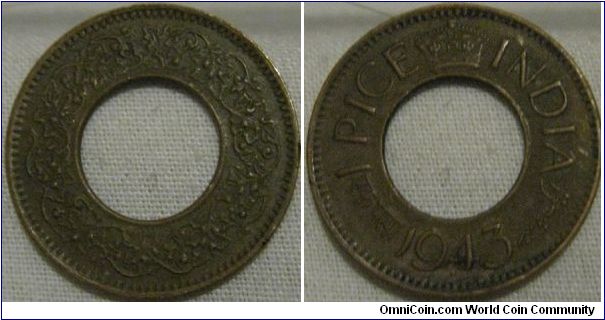 1 pice 1943 VF interesting coin with its arge hole