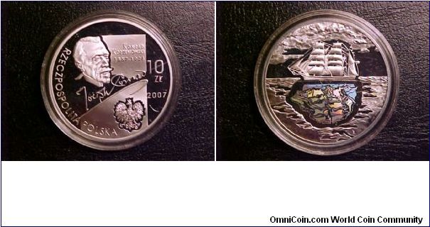 A commemorative proof 10-zloty coin for Joseph Conrad, showing the sailing ship on the reverse, with the reflection of the ship in the water done in hologram, for a very interesting and beautiful effect!
