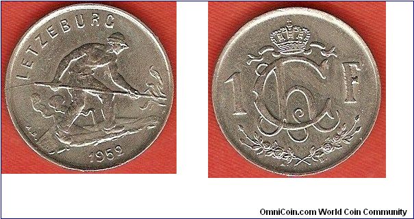 1 franc
man working field
monogram of grand-duchess Charlotte
copper-nickel
designer: Armand Bonnetain
size:21 mm