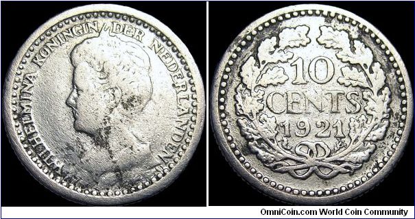 Netherlands - 10 Cents - 1921 - Silvercoin Ag 0,6400 - Ag 0,0288 Troy Ounce - Weight 1,4 gr - Size 15 mm - Ruler / Wilhelmina I (1890-1948) - Designer / J.C. Wienecke - Mintage 5 000 000 - Edge : Reeded - Reference KM# 145 (1910-25)