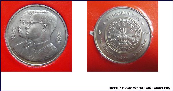 Y# 296 2 BAHT
Copper-Nickel Clad Copper, 22 mm. Ruler: Bhumipol
Adulyadej (Rama IX) Subject: 60th Anniversary - Thammasat
University June 27