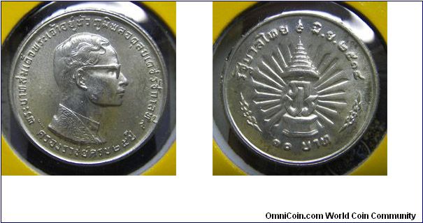 Y# 92 10 BAHT
5.0000 g., 0.8000 Silver 0.1286 oz. ASW, 20 mm. Ruler:
Bhumipol Adulyadej (Rama IX) Subject: 25th Anniversary -
Reign of King Rama IX June 9