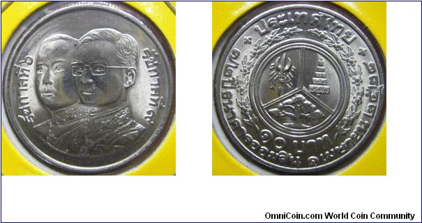 Y# 175 10 BAHT
Nickel, 32 mm. Ruler: Bhumipol Adulyadej (Rama IX) Subject:
72nd Anniversary of Government Savings Bank April 1