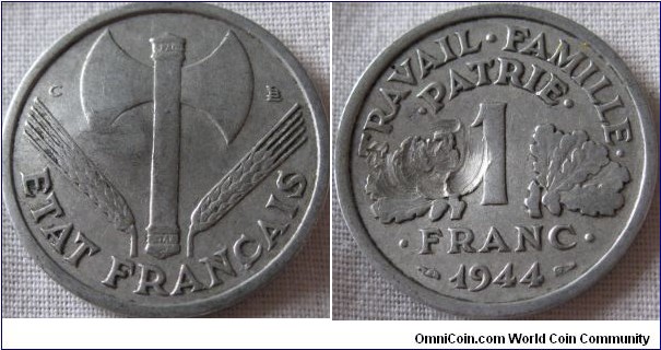 1944 C 1 franc, scarcer type sadly someone has tried to drill it