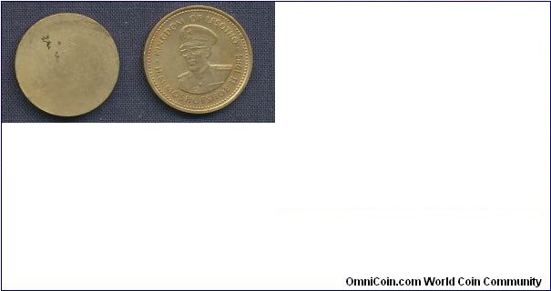 Unstruck planchet 1 sente with struck coin (1985)