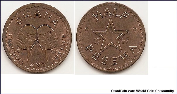 1/2 Pesewa
KM#12
Bronze, 20.3 mm. Obv: Bush drums Rev: Star divides date and denomination