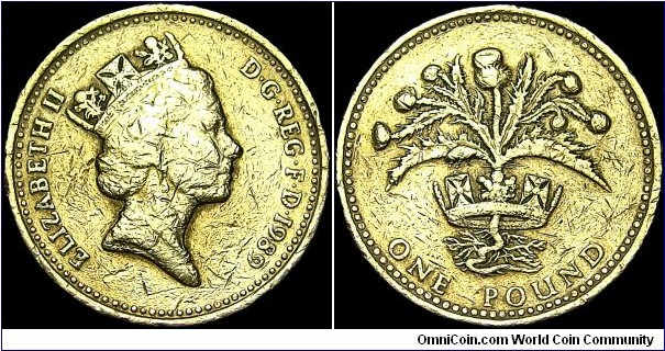 United Kingdom - 1 Pound - 1989 - Weight 9,5 gr - Nickel / Brass - Size 22,5 mm - Thickness 3,15 mm - Alignment : Medal (0) - Ruler / Elizabeth II (1952-) - Reverse / Scottish Thistle - Obverse Designer / Raphael Maklouf - Reverse Designer / Leslie Durbin - Edge : Lettering and fine milled - Edge lettering : NEMO ME IPUNE LACESSIT (No-one provokes me with impunity) - Mintage 70 581 000 - Minted in : Liantrisant UK - Reference KM# 959 (1989) 