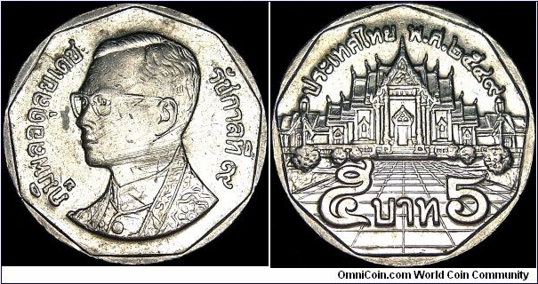 Thailand - 5 Baht - 2006 (BE 2549) - Weight 7,5 gr - Copper / Nickel - Size 24 mm - Thickness 2,12 mm - Ruler / Rama IX Bhumibol Adulyadej (1946-) - Alignment : Coin (180) - Obverse / King Rama IX - Reverse / Penjahwat - Designer / Supab Aun-aree - Edge : Reeded - Mintage 254 702 000 - Reference Y# 219 (1988-2006)