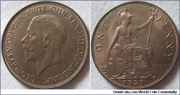 1929 penny, aUNC, some signs of wear on the facial hair of george but bar a few spots full lustre