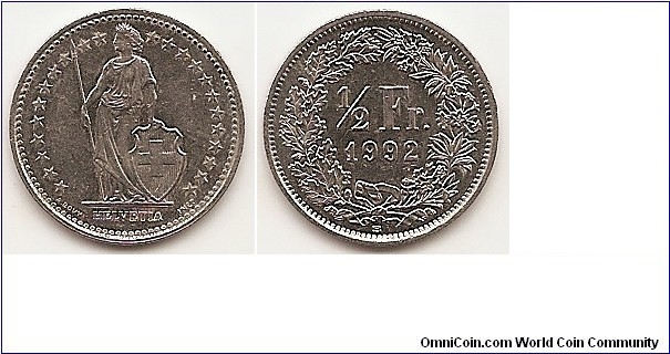 1/2 Franc
KM#23a.3
2.2000 g., Copper-Nickel, 18.1 mm.   Obv: 23 Stars around figure Rev: Value within wreath Edge: Reeded Designer: A. Bovy