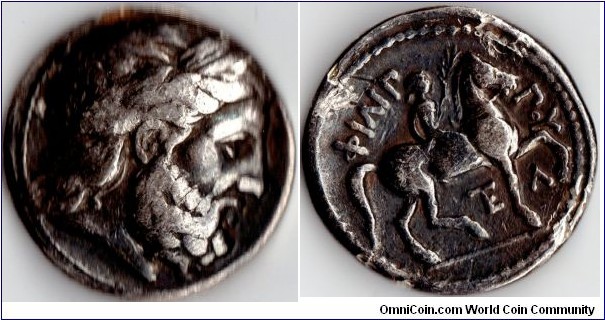 silver tetradrachm of Philip II of Macedon (Father of Alexander the Great). This coin struck circa 348 bc.
Obverse Zeus. Reverse naked boy rider on horseback. Lambda under foreleg and TE under horse belly.