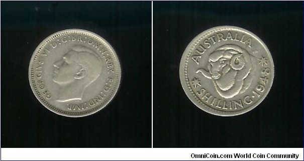 1948 Shilling. Mis-strike creating a small lip