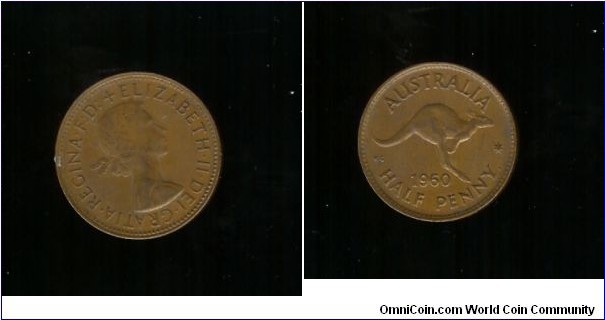 1960 Halfpenny. Dots either side of the Queen's neck.