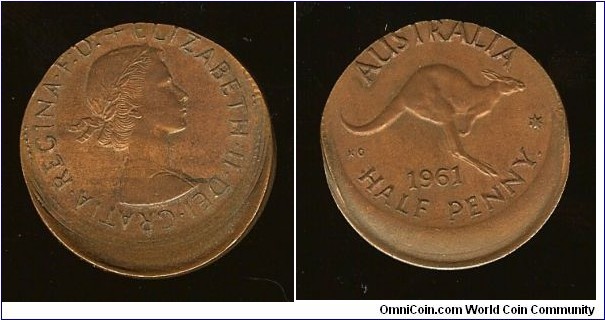 1961 Halfpenny. Massive 4.5mm mis-strike. SCARCE