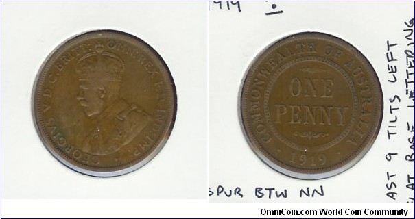 1919 Penny. Dot Above Bottom Scroll. London Obv. Spur between 'NN'. Last '9' tilts left.